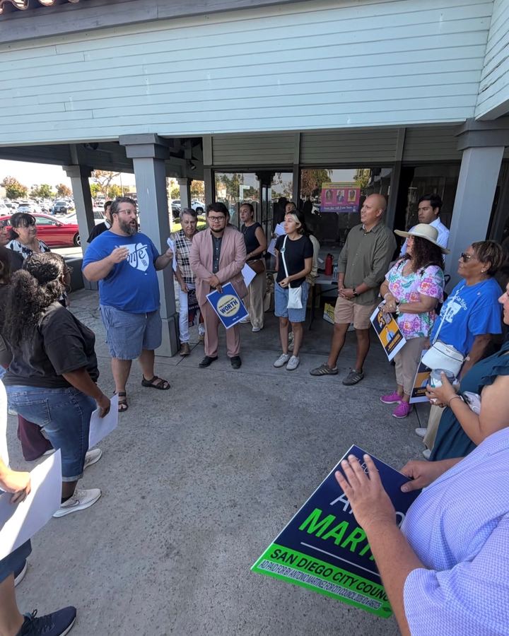 Volunteers gathered for a canvassing briefing before walking the neighborhood